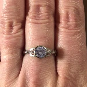 Size 9 ring with light purple stone